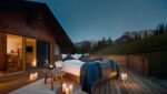 Sterntaler Bett auf der Terrasse unter dem Sternenhimmel der Schloßanger Alp in Pfronten im Allgäu